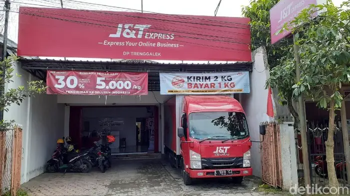 kurir sepeda motor ekspedisi jt express dbb227